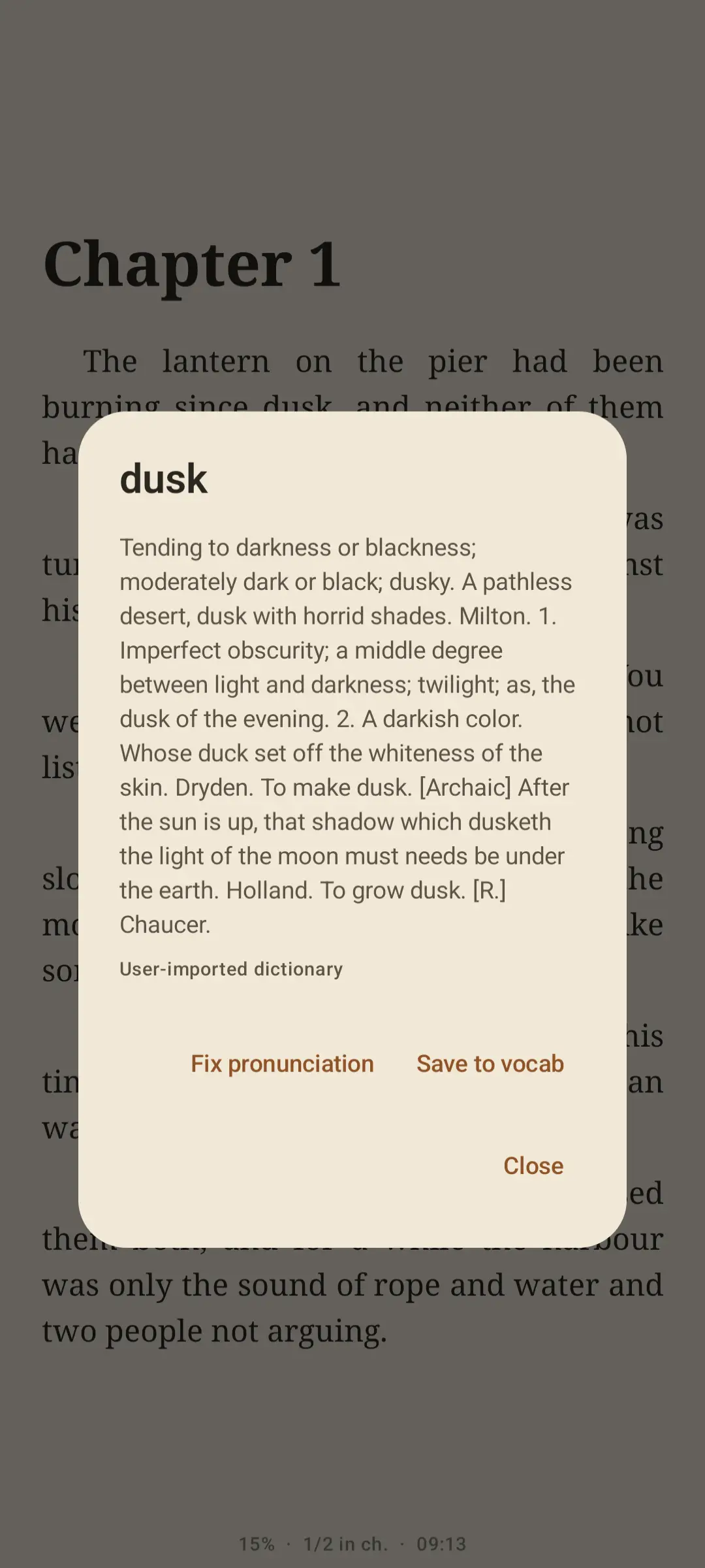 Lectern reader with a tap-and-hold popup showing a Webster's 1913 definition of the word dusk